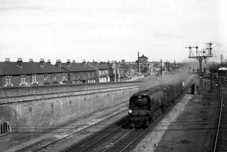 BR(S) West Country class 34008 'Padstow' at Eastleigh, Hampshire with a Waterloo - Southampton Docks service on Wednesday 27 Aug 1952 - J.H.W. Kent [090545]