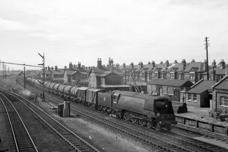 BR(S) West Country class 34044 'Woolacombe' at Eastleigh, Hampshire with a Northbound Oil tanks on Wednesday 27 Aug 1952 - J.H.W. Kent [090547]