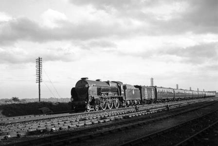 BR(S) Lord Nelson class 30856 'Lord St. Vincent' at Stoneham Sidings, Hampshire with an up Bournemouth service on Wednesday 27 Aug 1952 - J.H.W. Kent [090568]