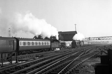 BR(S) Lord Nelson class 30855 'Robert Blake' & BR(S) S15 class 30831 at Clapham Junction, Greater London with a Waterloo - Bournemouth & Up service on Saturday 13 Sep 1952 - J.H.W. Kent [090601]