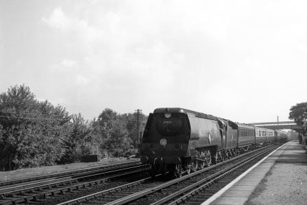 BR MN class 35021 'New Zealand Line' at Raynes Park Station, Greater London with a Waterloo - West of England service on Saturday 13 Sep 1952 - J.H.W. Kent [090604]