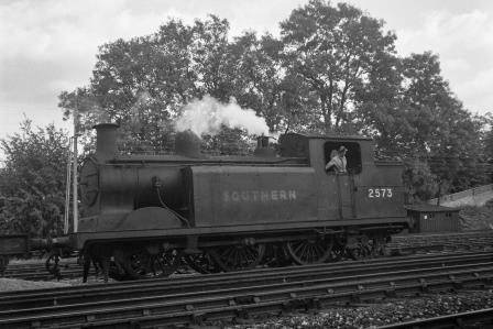 BR(S) E5 class 2573 passing Preston Park Pullman Car Works, East Sussex with a down Goods service in Sep 1952 - J.H.W. Kent [090620]