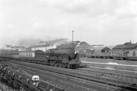 BR(S) Remembrance class 32329 'Stephenson' at Wimbledon, Greater London with a Waterloo - Basingstoke service on Saturday 30 May 1953 - J.H.W. Kent [090861]