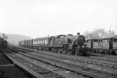 BR(S) 4P class 42090 passing Preston Park Pullman Car Works, East Sussex with a down Vans service on Friday 04 May 1951 - J.H.W. Kent [091309]
