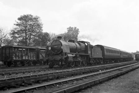BR(S) N class 31828 passing Preston Park Pullman Car Works, East Sussex with a Brighton - Lingfield Races Special on Friday 18 May 1951 - J.H.W. Kent [091346]