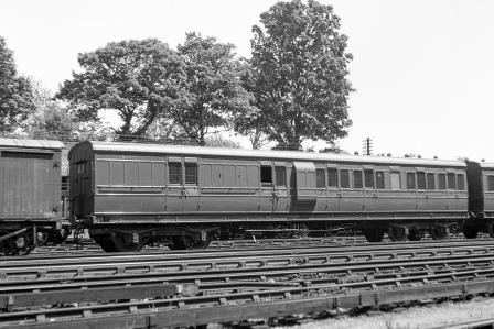 BR(S) Ex LSWR brake coach in empty stock rake. class S2972 passing Preston Park Pullman Car Works, East Sussex on Friday 08 Jun 1951 - J.H.W. Kent [091396]