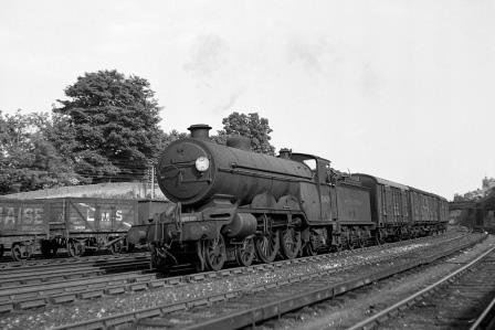 BR(S) Brighton Atlantic class 32424 'Beachy Head' passing Preston Park Pullman Car Works, East Sussex with an up Vans service on Thursday 21 Jun 1951 - J.H.W. Kent [091427]
