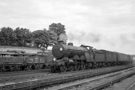 BR(S) Brighton Atlantic class 32424 'Beachy Head' passing Preston Park Pullman Car Works, East Sussex with an up Vans service on Wednesday 27 Jun 1951 - J.H.W. Kent [091435]