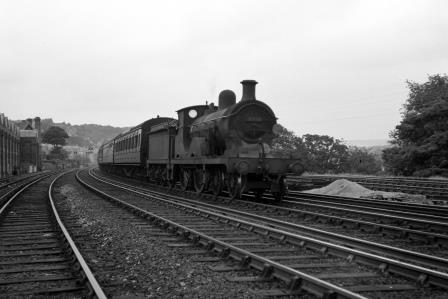 BR(S) D class 31737 passing Preston Park Pullman Car Works, East Sussex with a Birkenhead - Brighton service on Wednesday 18 Jul 1951 - J.H.W. Kent [091499]