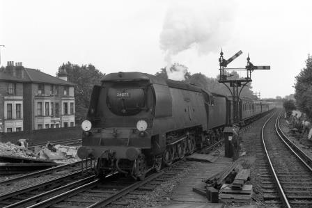 BR(S) Battle of Britain class 34077 '603 Squadron' at Shortlands, Greater London with a Dover Marine or Folkestone Harbour - Victoria Boat Train on Saturday 27 Sep 1958 - J.H.W. Kent [092132]