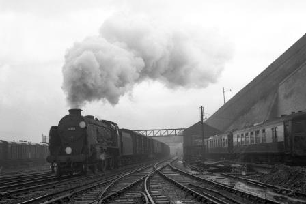 BR(S) Schools class 30900 'Eton' passing Preston Park Pullman Car Works, East Sussex with an up Vans Mail Special service on Wednesday 17 Dec 1958 - J.H.W. Kent [092224]