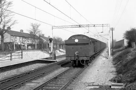 BR(E) N7 class 69702 at Highams Park, Greater London with a Chingford - Liverpool Street service on Saturday 28 Feb 1959 - J.H.W. Kent [092250]
