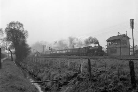 BR(E) B1 class 61283 passing Angel Road Junction Box, Greater London with a down Passenger Service on Saturday 14 Mar 1959 - J.H.W. Kent [092286]