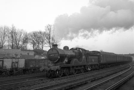 BR(S) L class 31777 passing Preston Park Pullman Car Works, East Sussex with an up Vans and Empty Stock service on Monday 23 Mar 1959 - J.H.W. Kent [092309]