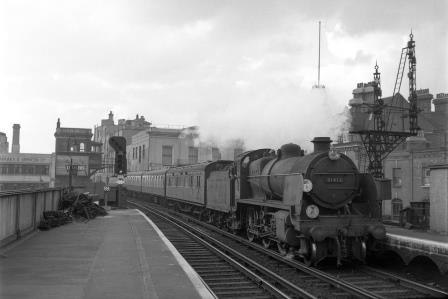 BR(S) N class 31412 at Brixton, Greater London with a Victoria - Eardley Sidings service on Easter Saturday 28 Mar 1959 - J.H.W. Kent [092335]