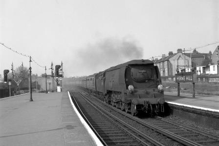 BR(S) Battle of Britain class 34083 '605 Squadron' at Herne Hill Station, Greater London with the 2.00pm Victoria - Dover Marine or Folkestone Harbour relief service on Saturday 04 Apr 1959 - J.H.W. Kent [092357]