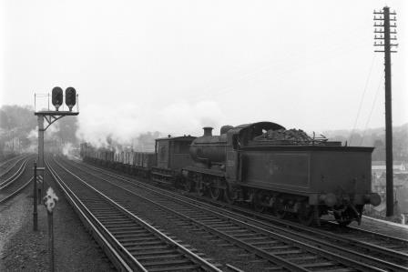 BR(S) K class 32339 passing Preston Park Pullman Car Works, East Sussex with a Southbound coal wagons in Mar / Apr 1962 - J.H.W. Kent [093211]