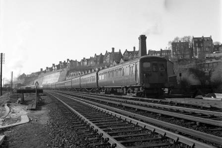 BR(S) Class 6-PAN 3035 & BR(S) Class 6-PUL 3003 passing Preston Park Pullman Car Works, East Sussex with the 7.37am Brighton - Victoria service on Sunday 15 Apr 1962 - J.H.W. Kent [093236]