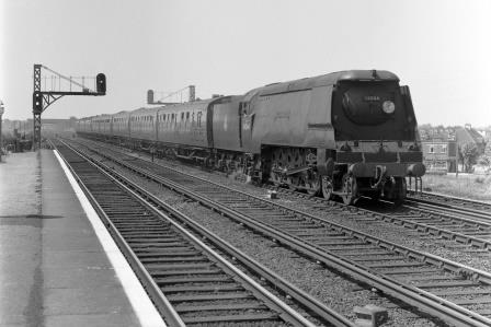 BR(S) West Country class 34044 'Woolacombe' at Raynes Park Station, Greater London with a Basingstoke - Waterloo service on Saturday 25 May 1957 - J.H.W. Kent [094418]