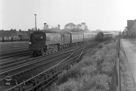 BR(S) West Country class 34010 'Sidmouth' approaching Wimbledon, Greater London with a Bournemouth or Weymouth - Waterloo service on Saturday 25 May 1957 - J.H.W. Kent [094428]
