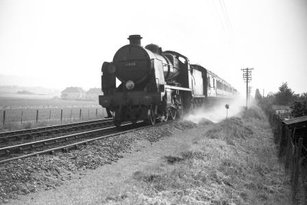 BR(S) U class 31808 between Fareham and Portchester, Hampshire with a Portsmouth - Salisbury via Redbridge service on Saturday 01 Jun 1957 - J.H.W. Kent [094434]