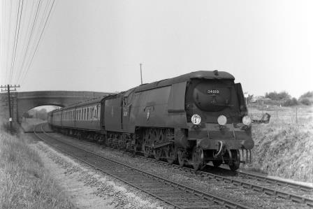 BR(S) West Country class 34019 'Bideford' between Fareham and Portchester, Hampshire with an Inter Regional train to Portsmouth via Basingstoke on Saturday 01 Jun 1957 - J.H.W. Kent [094445]
