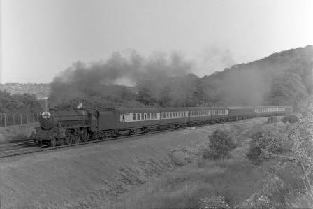 BR(M) 5MT class 44869 at Patcham, East Sussex with an up Inter Regional service (to ER possibly) service on Sunday 23 Jun 1957 - J.H.W. Kent [094483]