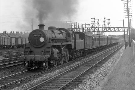 BR Std 4MT class 76025 passing Northam Sidings, Hampshire with a Southampton Terminus - Waterloo service on Thursday 25 Jul 1957 - J.H.W. Kent [094549]
