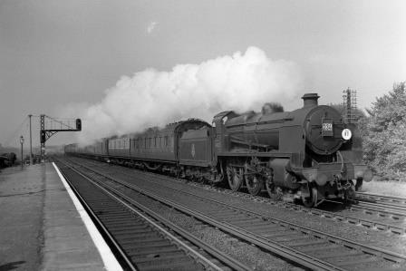 BR(S) U class 31623 at Raynes Park Station, Greater London with a Basingstoke - Waterloo service on Saturday 14 Aug 1954 - J.H.W. Kent [094754]