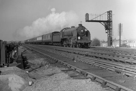 BR(S) King Arthur class 30748 'Vivien' at Raynes Park, Greater London with a Bournemouth or Weymouth - Waterloo service on Saturday 14 Aug 1954 - J.H.W. Kent [094755]