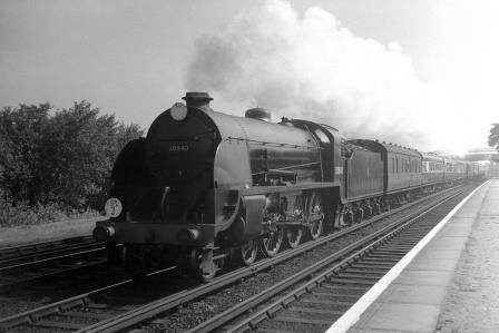 BR(S) S15 class 30840 at Raynes Park Station, Greater London with a Waterloo - Southampton Docks service on Saturday 14 Aug 1954 - J.H.W. Kent [094756]