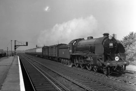BR(S) King Arthur class 30450 'Sir Kay' at Raynes Park Station, Greater London with a Salisbury - Waterloo service on Saturday 14 Aug 1954 - J.H.W. Kent [094759]