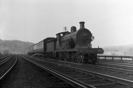 BR(S) D class 31737 passing Preston Park Pullman Car Works, East Sussex with a Birkenhead - Brighton/Hastings service on Friday 04 Mar 1955 - J.H.W. Kent [094817]