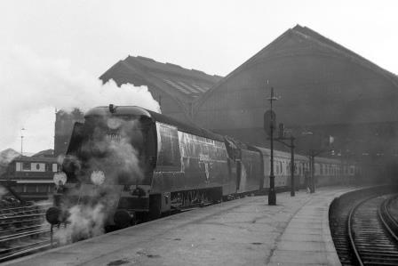 BR(S) West Country class 34048 'Crediton' at Brighton Station, East Sussex with a West of England train (Cardiff or Plymouth) on Saturday 24 Dec 1955 - J.H.W. Kent [095153]