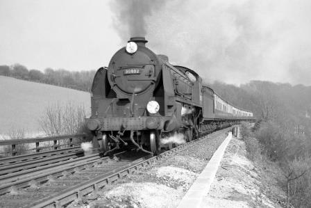 BR(S) King Arthur class 30802 'Sir Durnore' at Stone Street Bank, Kent with the 1.10pm Ramsgate - Victoria service on Saturday 04 Apr 1959 - J. Scrace [140249]