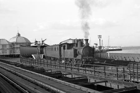 BR(S) O2 class W21 'Sandown' at Ryde Pier Head Station, Isle of Wight with the 6.08pm to Ventnor on Saturday 29 Aug 1964 - J. Scrace [141003]