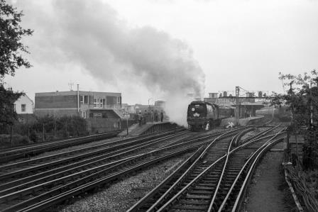 BR(S) West Country class 34002 'Salisbury' at Horsham Station, West Sussex with the 8.53pm Waterloo - Waterloo. "LCGB The Vectis Farewell" Rail Tour on Sunday 03 Oct 1965 - J. Scrace [141125]