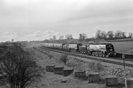 BR(S) West Country class 34006 'Bude' & BR(S) Battle of Britain class 34057 'Biggin Hill' between Binegar and Chilcompton, Somerset with the "LCGB S&D" Rail Tour on Saturday 05 Mar 1966 - J. Scrace [141170]