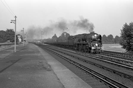 BR(S) West Country class 34013 'Okehampton' at Esher, Surrey with the 6.00pm Waterloo - Salisbury service on Thursday 18 Aug 1966 - J. Scrace [141209]
