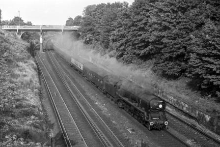 BR(S) West Country class 34013 'Okehampton' at Surbiton, Greater London with the 5.09pm Waterloo - Basingstoke service on Friday 09 Jun 1967 - J. Scrace [141216]
