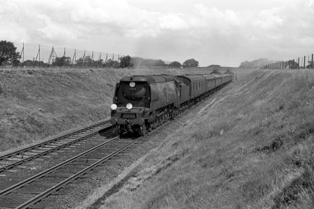 BR(S) Battle of Britain class 34057 'Biggin Hill' near Hamble Halt, Hampshire with the 11.30am Brighton - Plymouth service on Thursday 25 Jul 1963 - J. Scrace [141438]