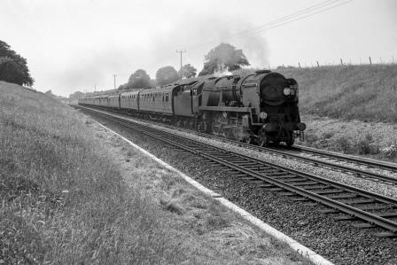BR(S) Battle of Britain class 34071 '601 Squadron' near Sway, Hampshire with the 10.50am Weymouth - Waterloo service on Saturday 23 Jul 1966 - J. Scrace [141495]