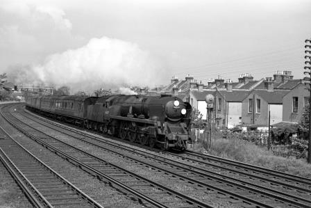 BR(S) Battle of Britain class 34077 '603 Squadron' between Shortlands and Bromley South, Greater London with the 10.42am Victoria - Folkestone Harbour Boat Train on Sunday 28 May 1961 - J. Scrace [141506]
