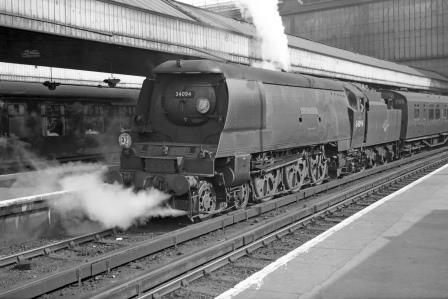 BR(S) West Country class 34094 'Mortehoe' at Waterloo Station, Greater London with the 8.35am to Weymouth on Tuesday 04 Jun 1963 - J. Scrace [141608]