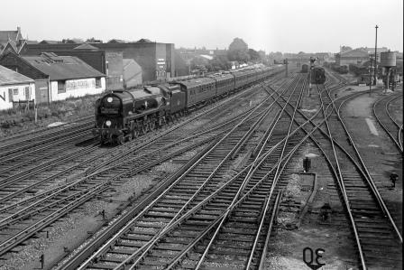 BR(S) Merchant Navy class 35014 'Nederland Line' at Wimbledon, Greater London with the down "Atlantic Coast Express" on Wednesday 12 Jun 1963 - J. Scrace [141784]