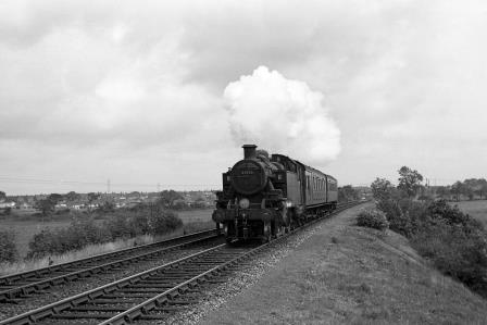 BR(M) 2MT class 41238 at 1/2 mile from Wareham, Dorset with the 11.10am to Swanage on Thursday 11 Jun 1964 - J. Scrace [141883]