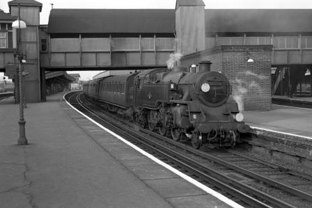 BR Std 4MT class 80094 at Clapham Junction Station, Greater London with the 6.48pm Victoria - East Grinstead service on Monday 08 Jul 1963 - J. Scrace [142538]