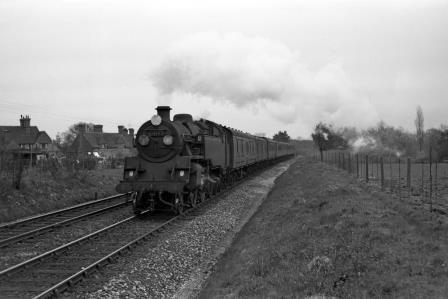 BR Std 4MT class 80152 near Hurst Green, Surrey with the 1.55pm Brighton - Victoria service on Easter Monday 23 Apr 1962 - J. Scrace [142674]