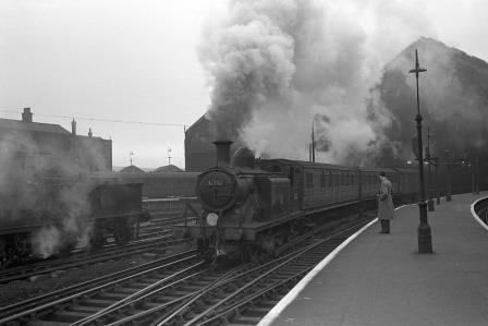 BR(S) E4 class 32562 leaving Brighton Station, East Sussex with the 12.12pm Horsham departure on Saturday 16 Mar 1957 - J.H.W. Kent [150286]