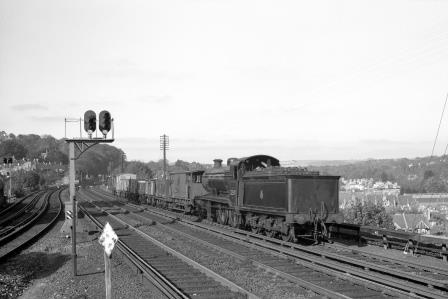 BR (SR) K class 32338 passing Preston Park Pullman Car Works, East Sussex with a Southbound Goods on Friday 24 Oct 1958 - J.H.W. Kent [150433]
